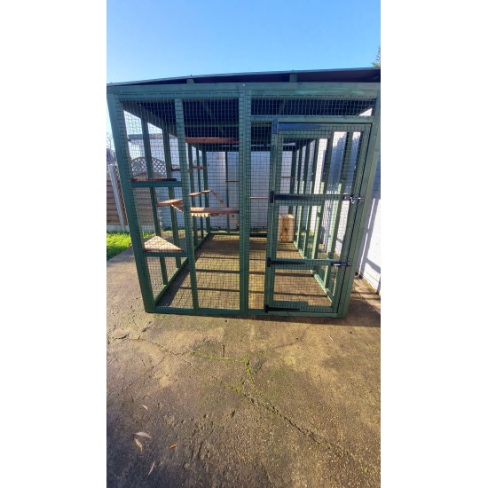 Waterproof Four-Sided Catio cat enclosure painted green.  182CM (6FT) X 274CM (9FT)